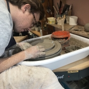 Pottery Student Throwing a Plate Sonya Ceramic Art Tuition